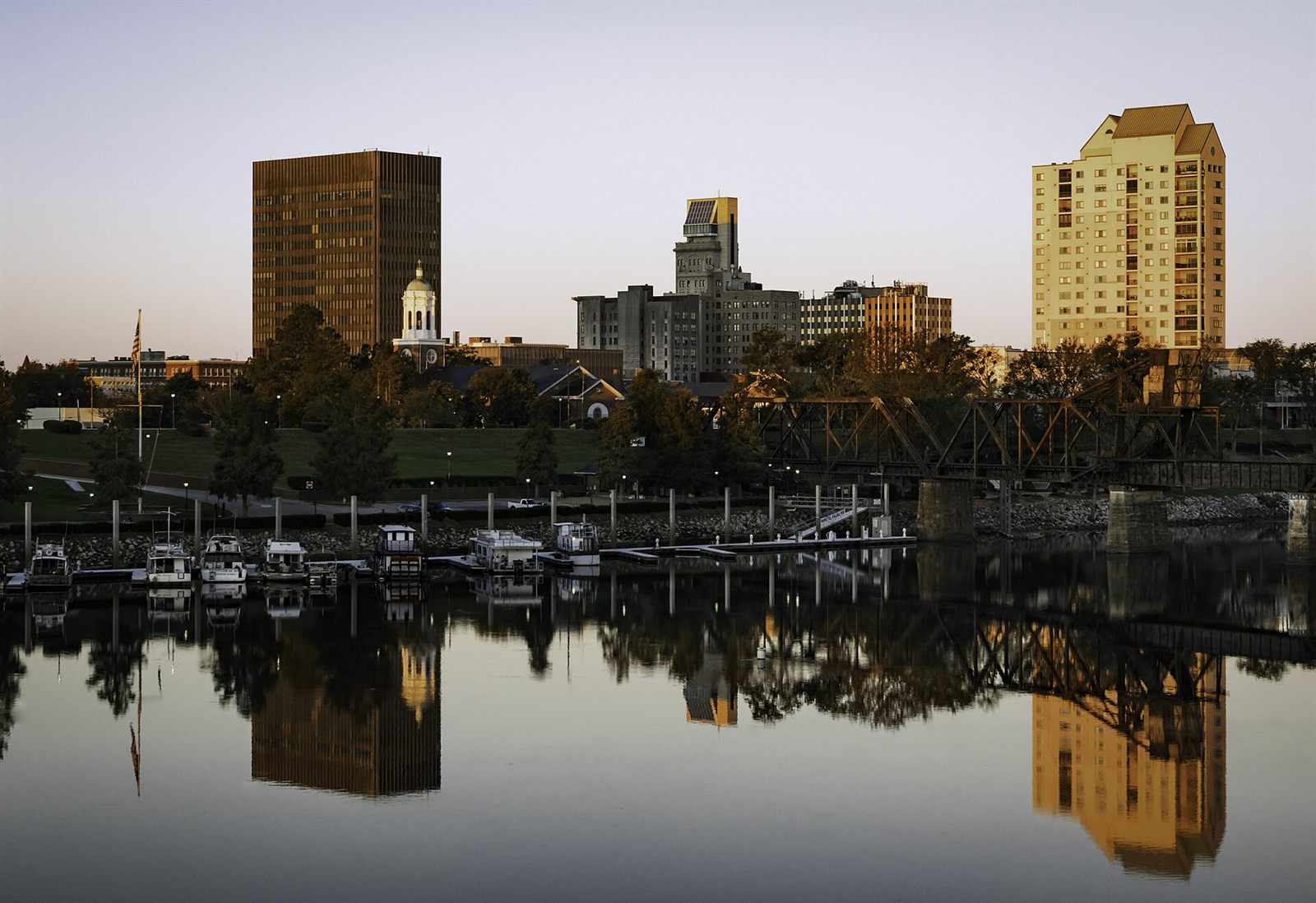 Downtown Augusta, Georgia skyline reflected in the Savannah River at dusk