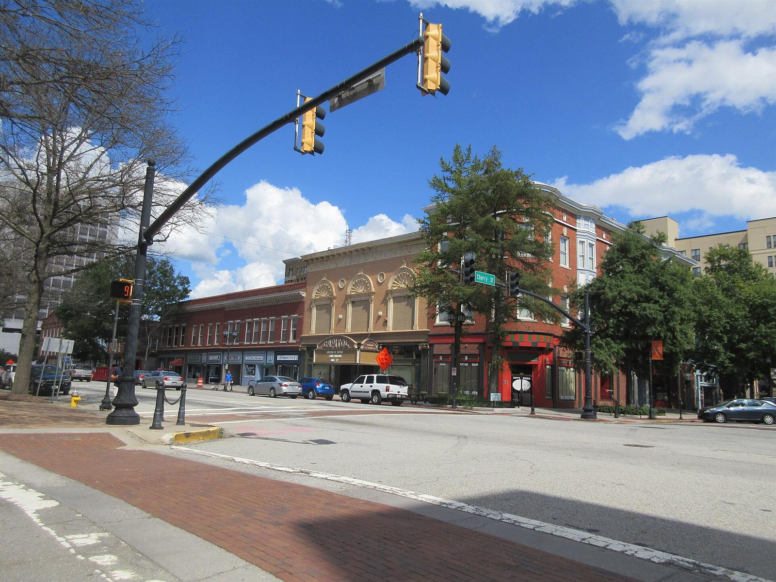 Historic storefronts and theater marquee on Cherry Street in downtown Macon, Georgia