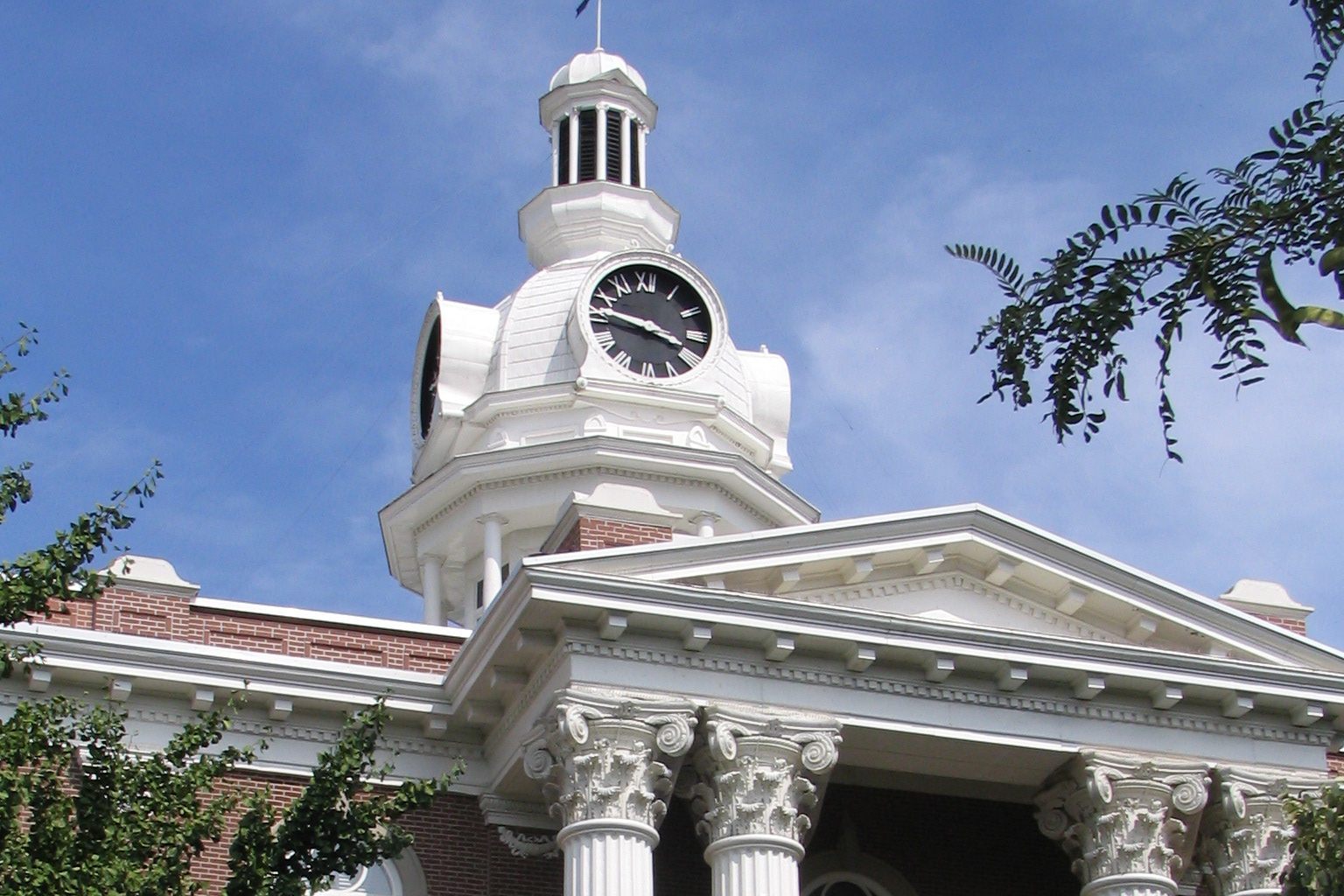 Clock tower and columns of the Rutherford County Courthouse on the square in Murfreesboro, Tennessee