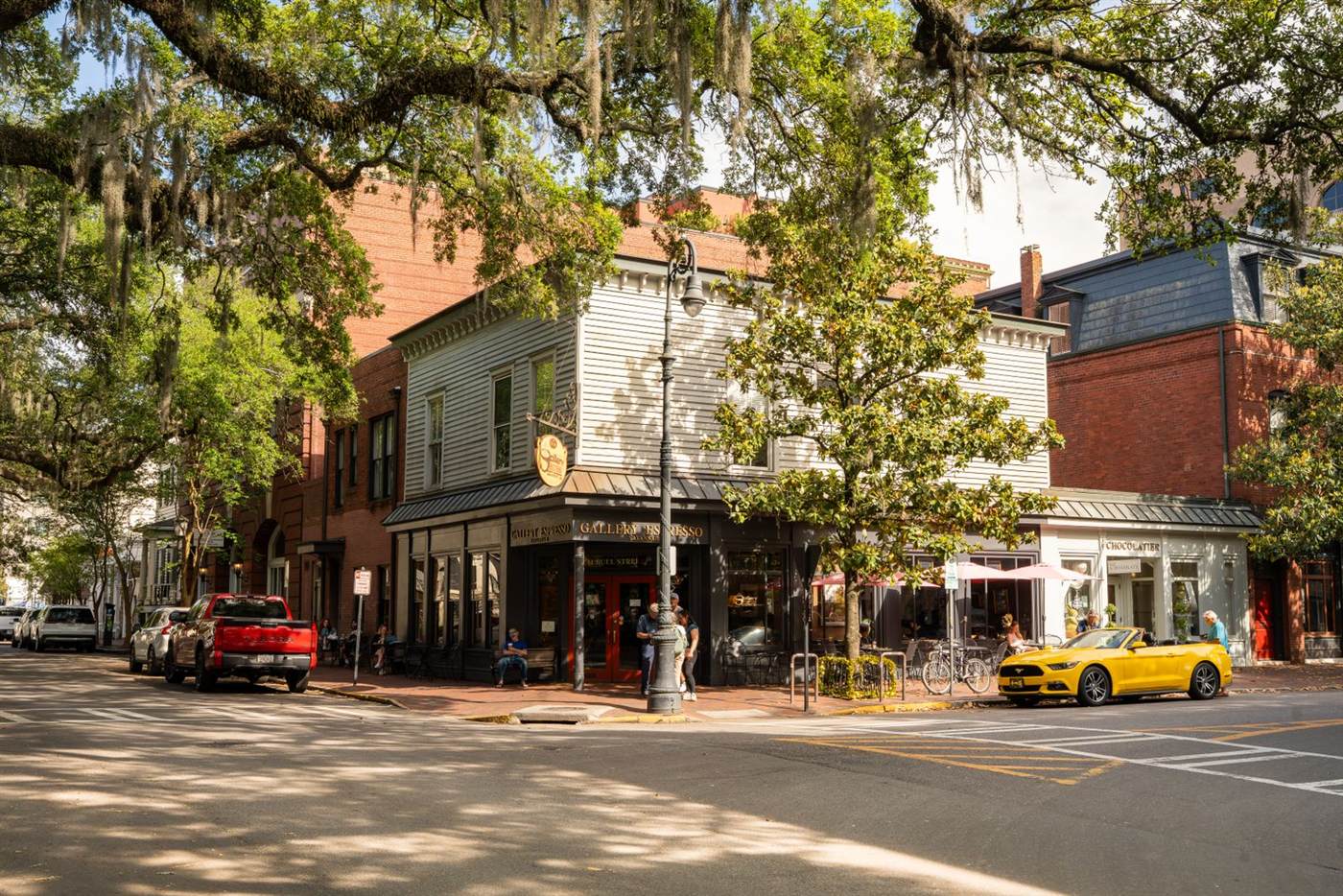 Oak-shaded street corner with Spanish moss in Savannah's historic district